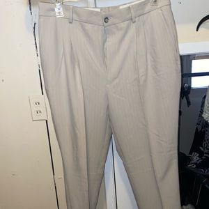Men dress suit pants. Size 36x30, brand Claiborne, light tan/crème color